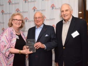 Richard Silver receives the 2019 SilverSource Champion Award. Left to right, SilverSource Executive Director Kathleen Bordelon, Honoree Richard Silver and Board Chair Jerome Berkman. Photo Credit: Studio Smith